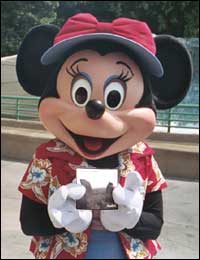 Minnie Mouse holding the CD AVALON 
